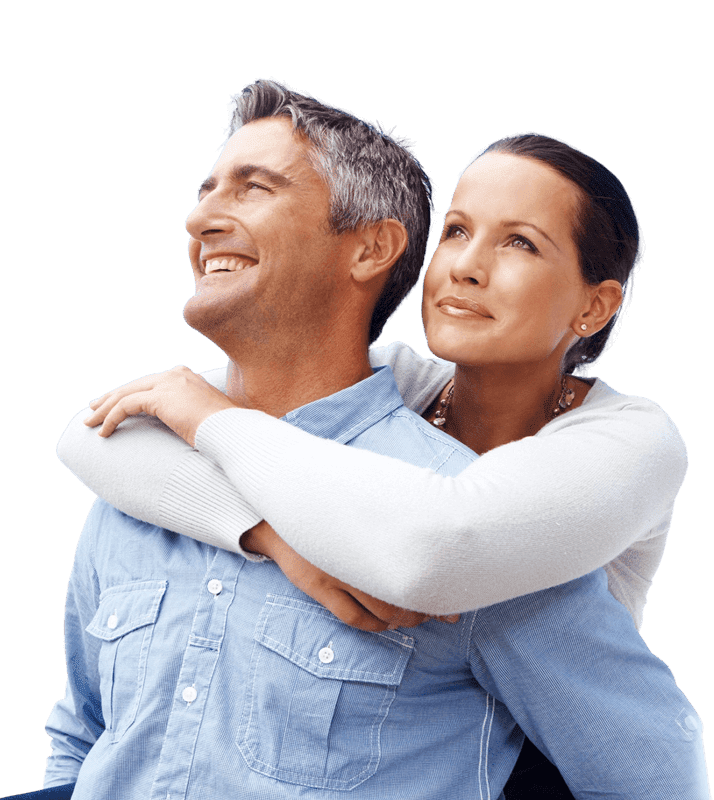Happy middle aged couple smiling | Luxe Laser Medspa
