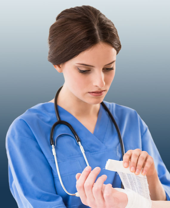 Female nurse wrapping a patient's wound | Internal Medicine & Wound Care